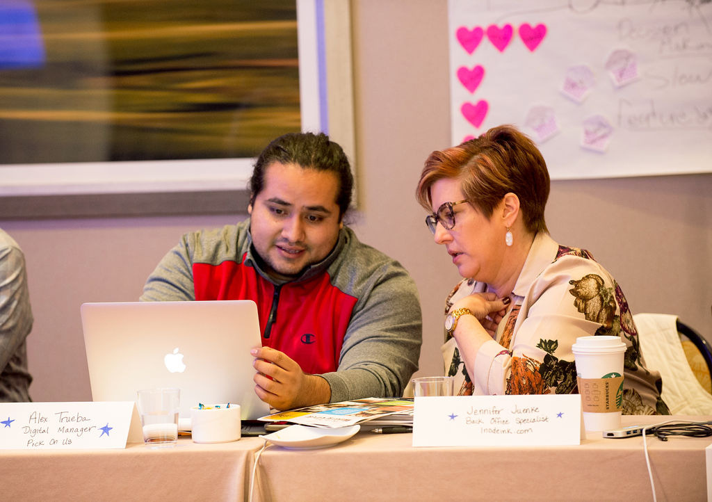 An attendee getting one-on-one help at her laptop