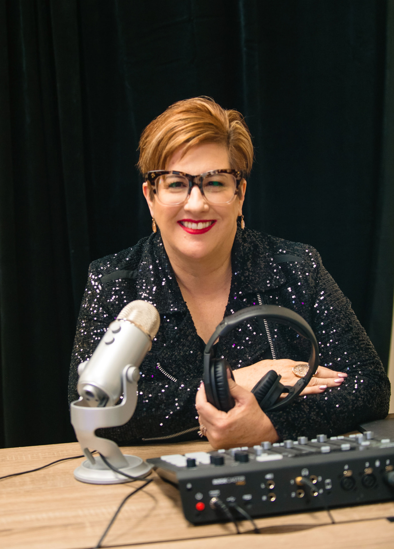 Heather Lutze in the podcast studio